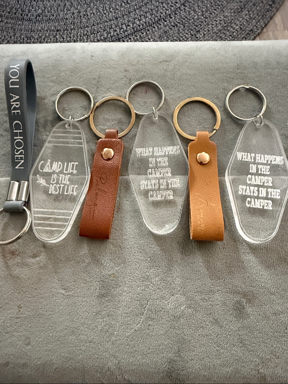New set of six keychains, plastic and faux leather